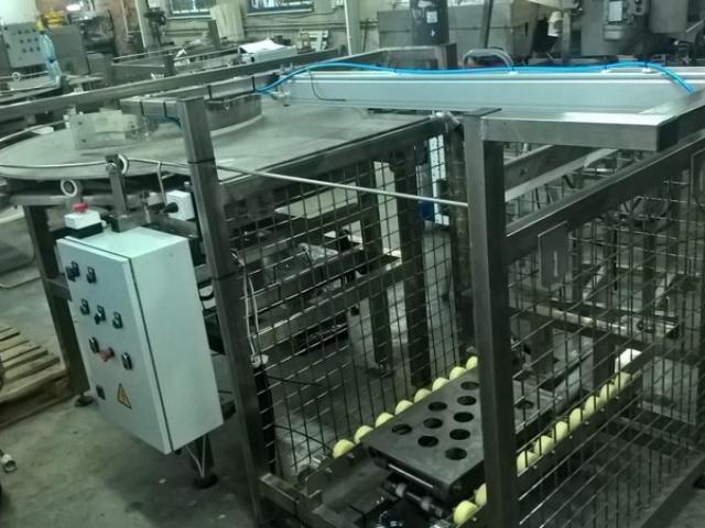 Комплекс загрузки и выгрузки тары из прямоугольных автоклавных корзин (с подвижным дном) в Заполярном